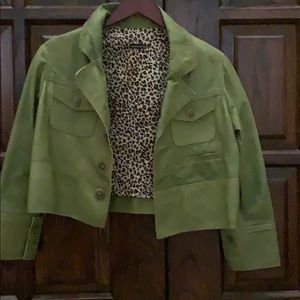 Green leather jacket.